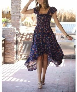 Ananda's Collection | Navy Floral Smocked Flutter-Sleeve Hi-Low Dress - Women -Ananda's Collection Shop zu97855627 alt 2 tm1626874452